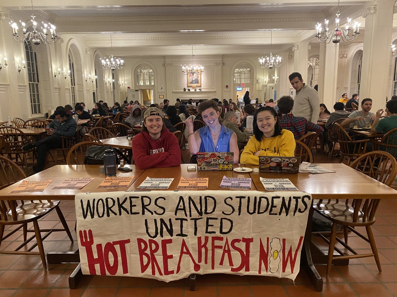 Students from Harvard’s Student Labor Action Movement table in Kirkland House.