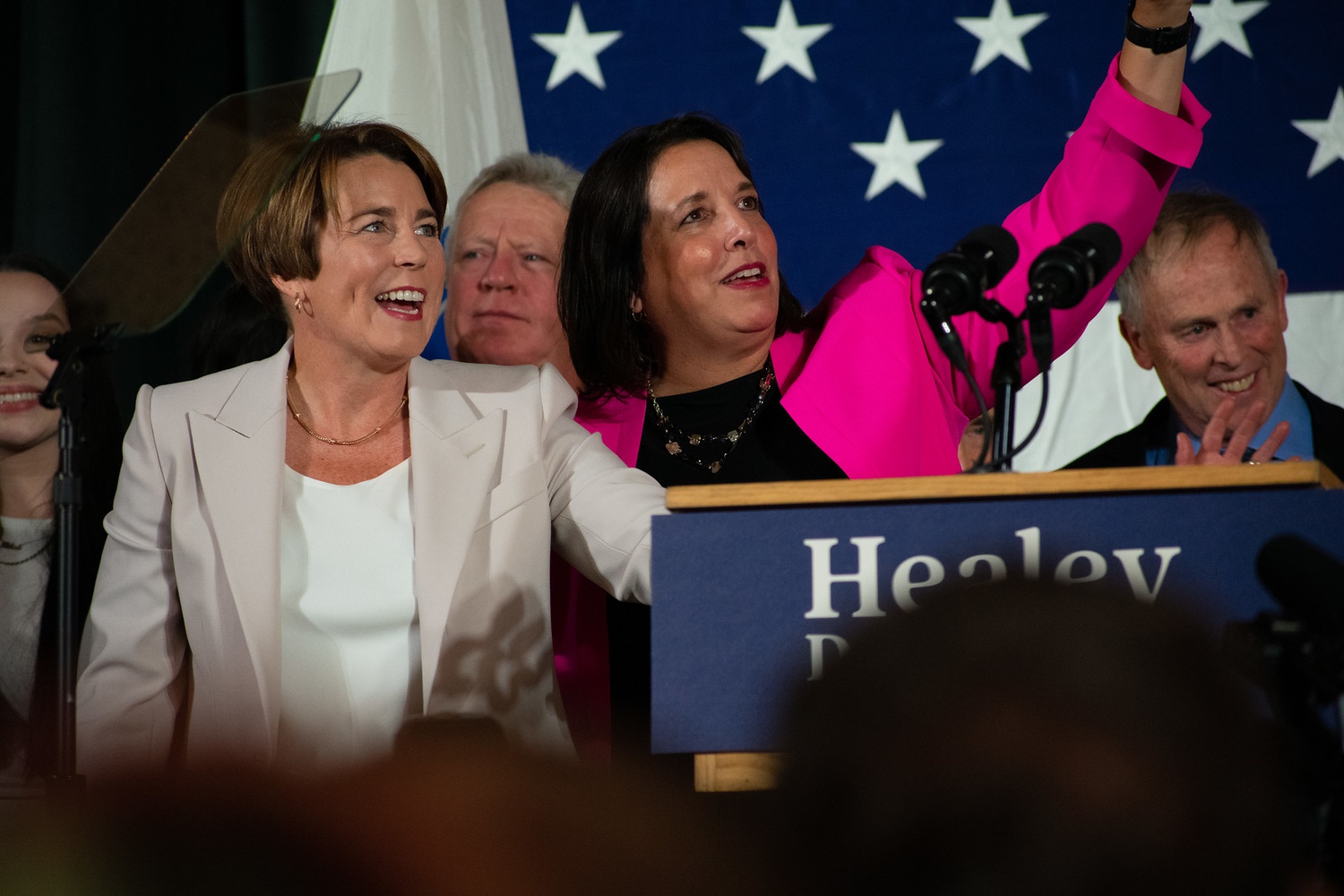 Maura T. Healey '92, left, and Kimberly Driscoll wave to supporters at a Democratic victory party in Boston.