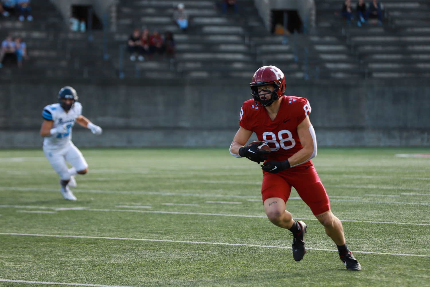 Junior tight end Tyler Neville runs along the left sideline during last Saturday's 21-20 loss to Columbia. Neville figures to play a major role in the passing game in Philadelphia, especially given the Quakers' strong rush defense.