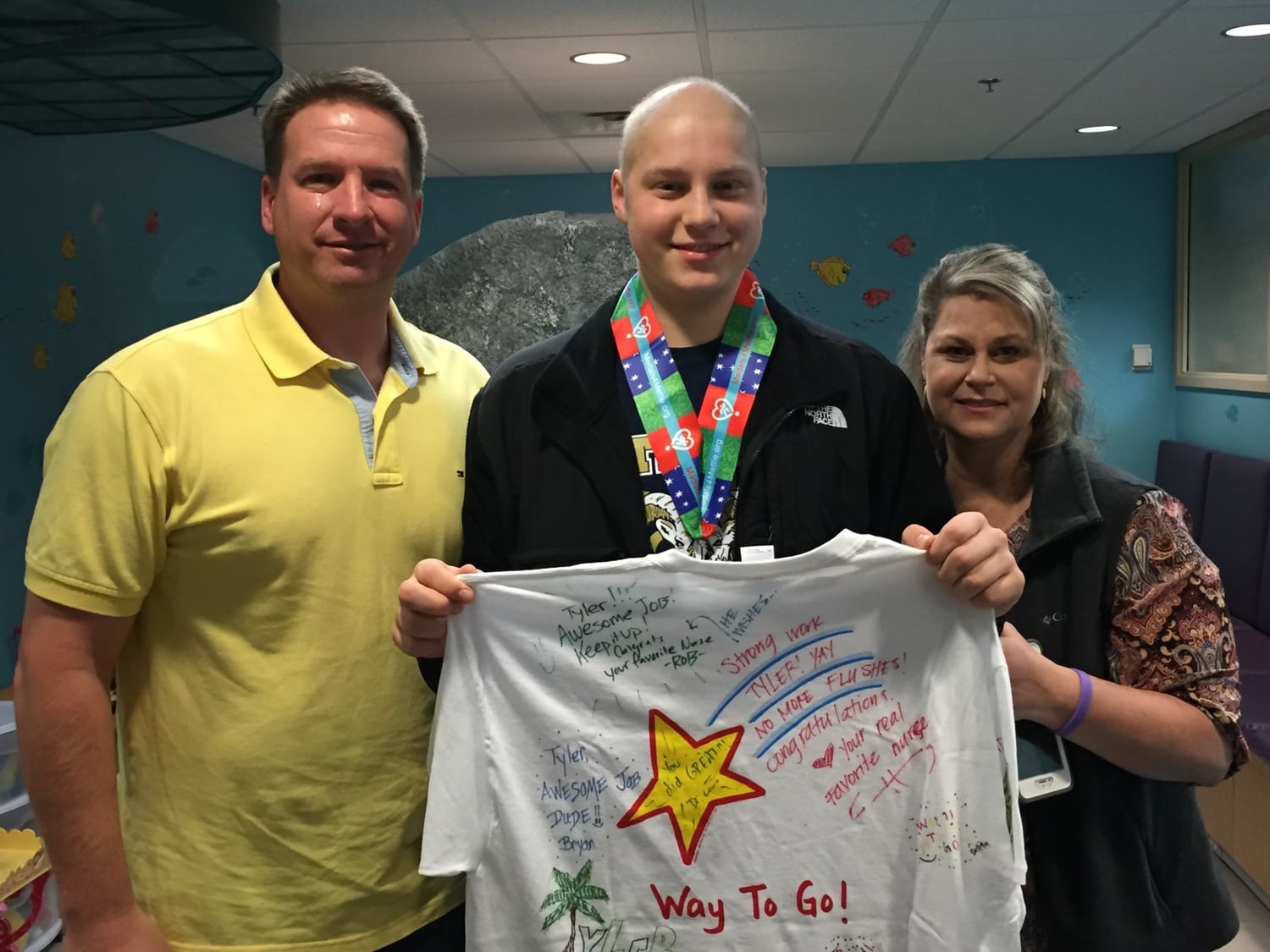 Tyler Neville pictured with his family. Neville credits much of his strength and resilience to his parents and siblings.