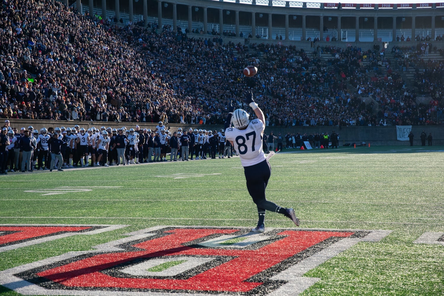 Yale junior Jackson Hawes receives a pass in the end zone in the fourth quarter of the Harvard-Yale game Saturday. The catch gave the Bulldogs a lead that it never relinquished.