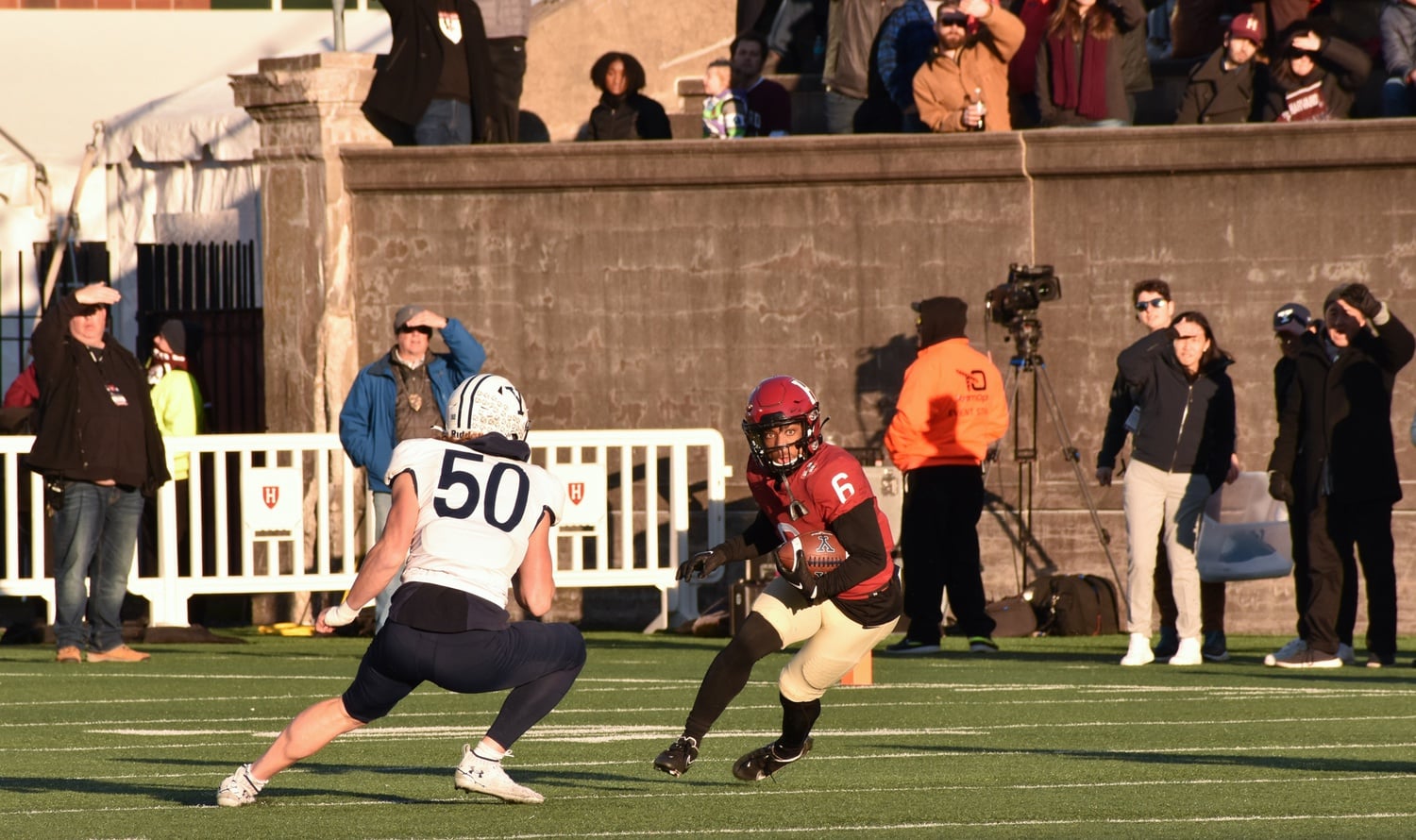 Sophomore wide receiver Scott Woods II looks to make a cut in Saturday's 19-14 loss to Yale. Woods had a breakout performance, scoring the second touchdown of his career on a 64-yard catch-and-run in the second quarter.