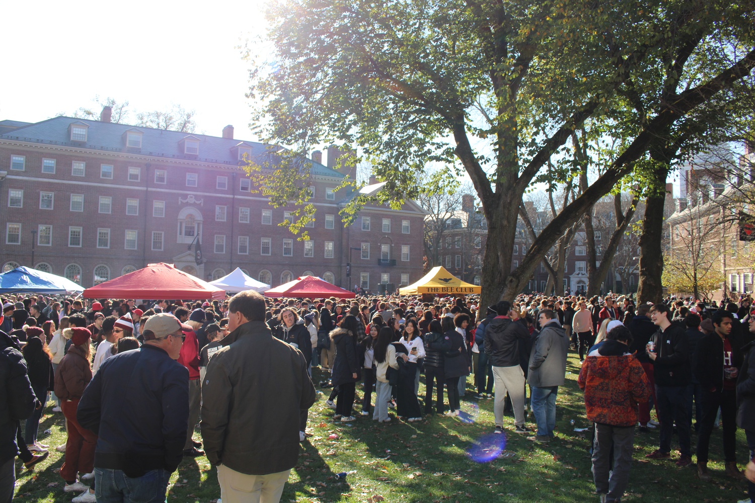 Harvard and Yale undergraduates attended an unofficial tailgate on the lawn in front of the Malkin Athletic Center before the 2022 Harvard-Yale Game.