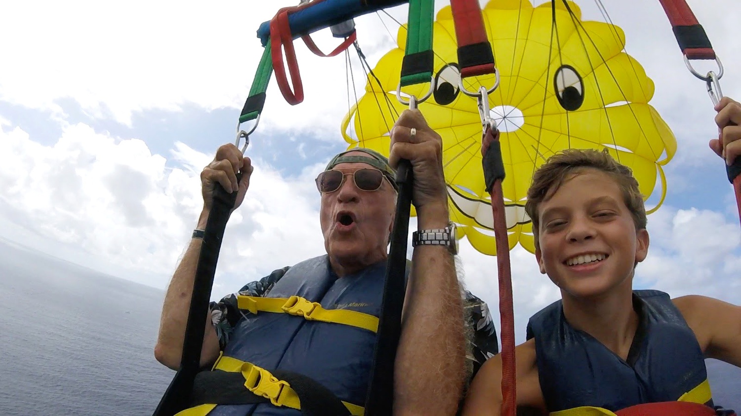 Luke T. Balstad ’25 with his grandfather in Hawaii.