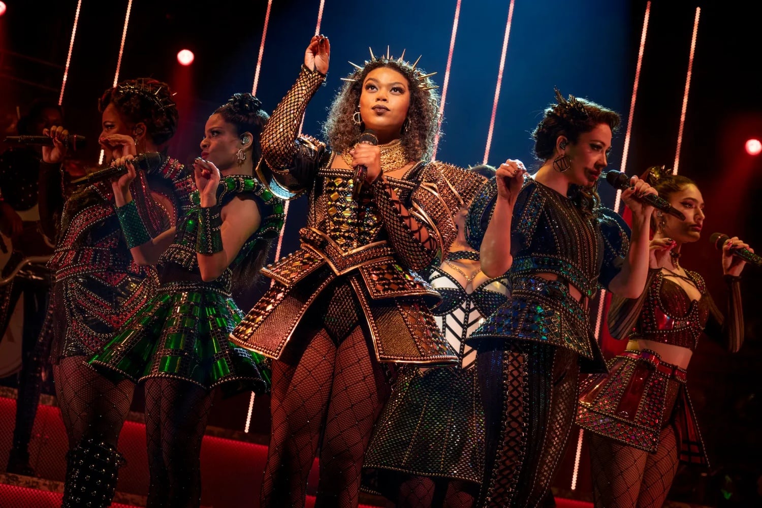 Khaila Wilcoxon as Catherine of Aragon (center) in The North American Tour Aragon Company of SIX.