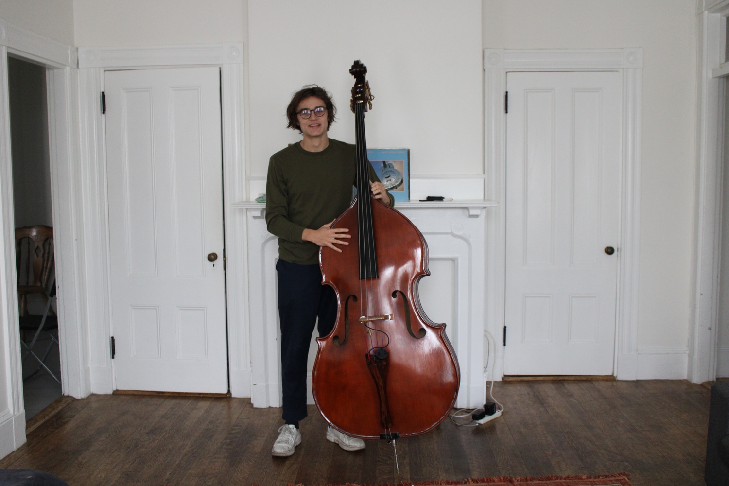 William "Willie" Swett '22, a student at the New England Conservatory, plays his bass at  Suffolk County's Nashua Street Jail as part of the Radcliffe Institute's "Music and Justice" working group.
