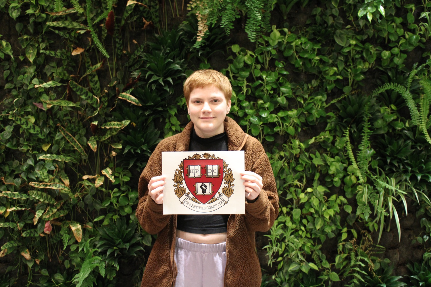 Brit G. Shrader '24 is a member of the Harvard Prison Divestment Campaign, a student-led abolitionist campaign which continues to campaign for further transparency surrounding Harvard's investments.