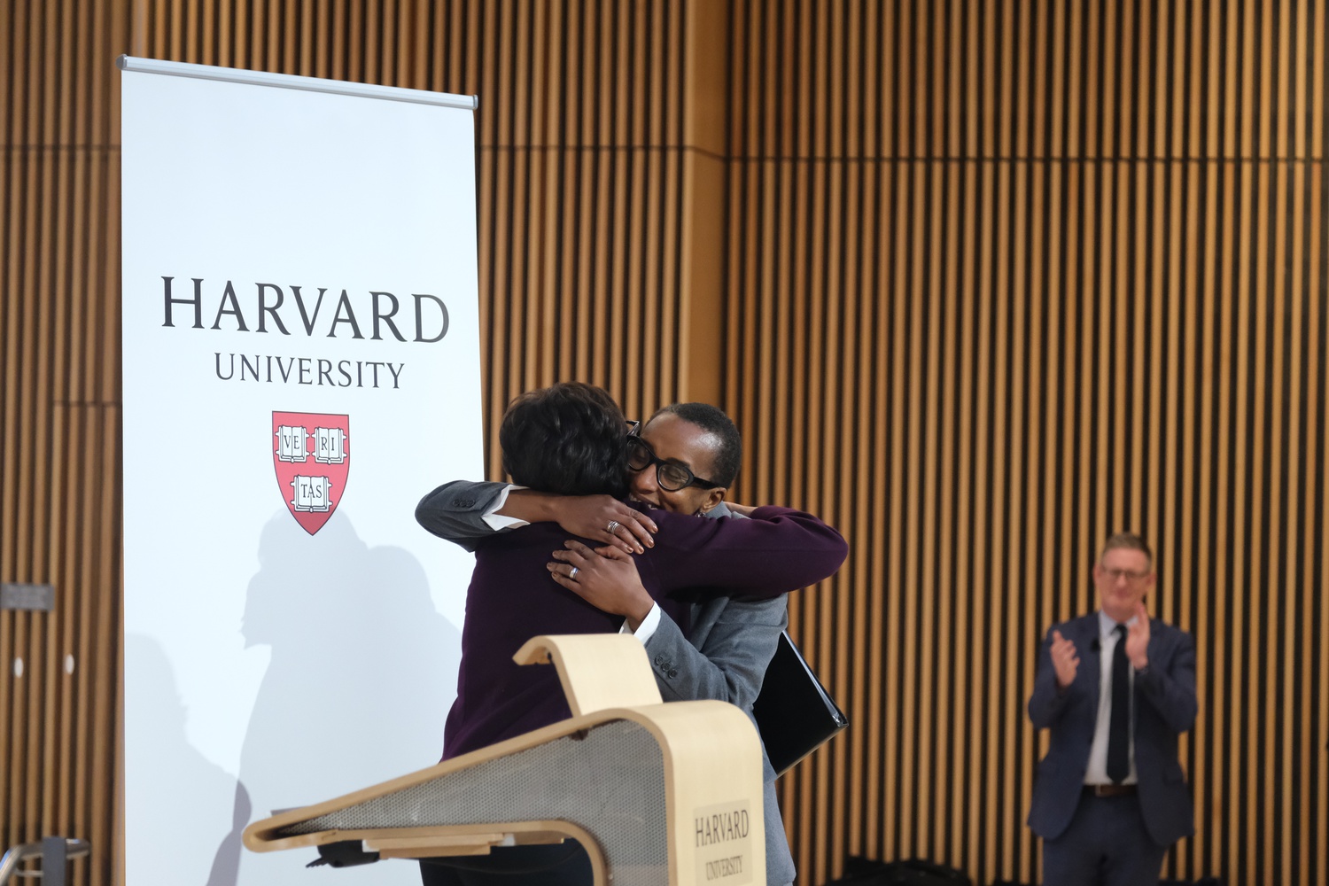 Harvard President Claudine Gay, pictured hugging Senior Fellow Penny S. Pritzker '81, was announced for the role less than one year ago.