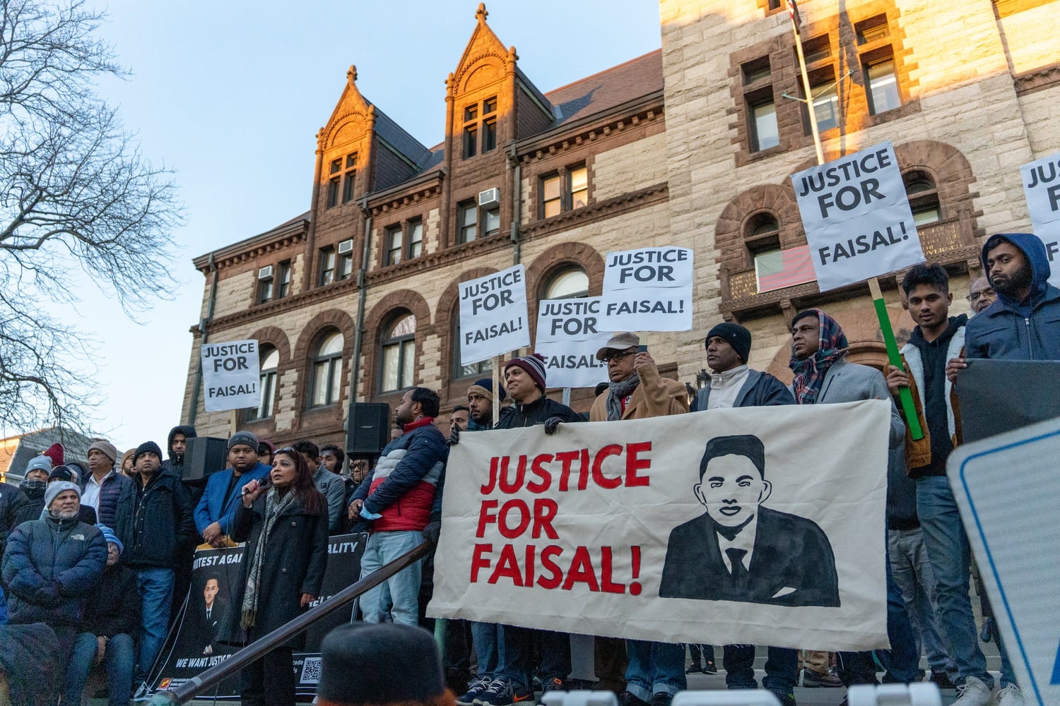 Demonstrators rallied outside Cambridge City Hall earlier this month to protest the killing of 20-year-old Sayed Faisal.
