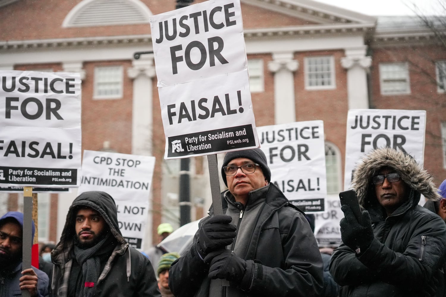 More than a hundred protesters gathered in the Harvard Square Pit for a demonstration following the fatal shooting of Sayed Faisal by a Cambridge Police Department officer.