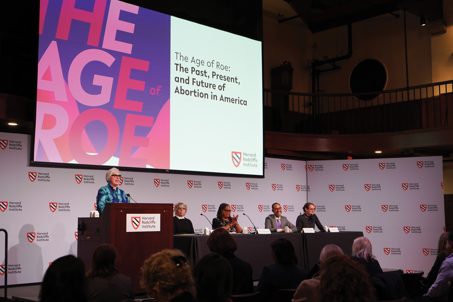 Professor Jane Kamensky speaks at the Friday session of Radcliffe Institute's Age of Roe conference. Panelists professors Jill Lepore, Evelynn M. Hammonds, I. Glenn Cohen, and Erika Bachiochi look on.