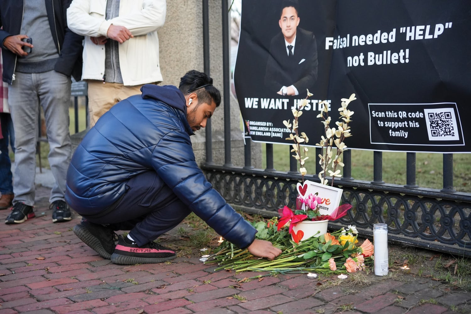 Cambridge residents held a vigil for Sayed Faisal on Jan. 11 at the Cambridgeport corner where he was killed by police.