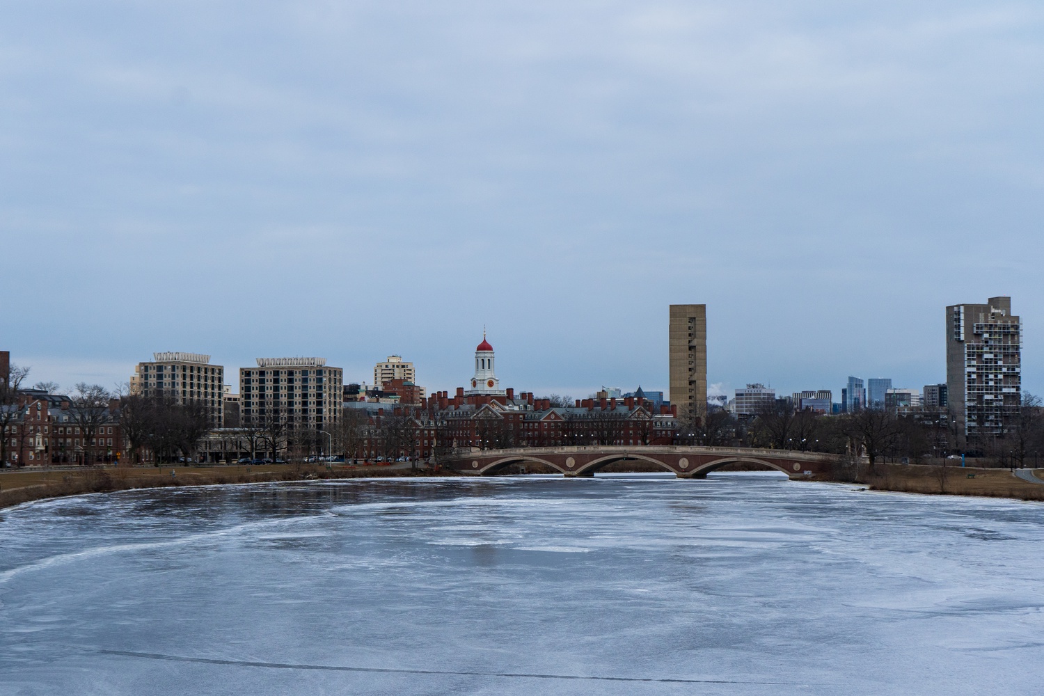 The Charles River froze over this weekend as an arctic blast hit the Boston area, chilling Harvard's campus to a six-decade low of minus 10 degrees Fahrenheit.