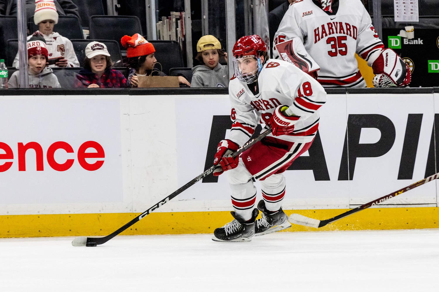 Junior forward Alex Laferriere shields the puck from Boston College in the Beanpot semifinal on February 6. Laferriere provided the key assist on the game-winning goal.