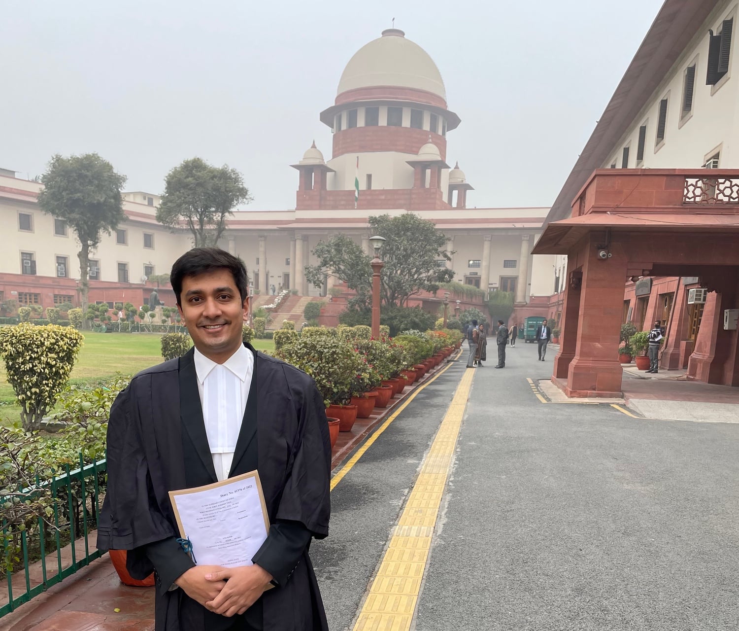 Utkarsh Saxena, a Harvard Law School and Harvard Kennedy School graduate, stands outside the Supreme Court of India after a hearing for his petition to legalize same-sex marriage in the country.