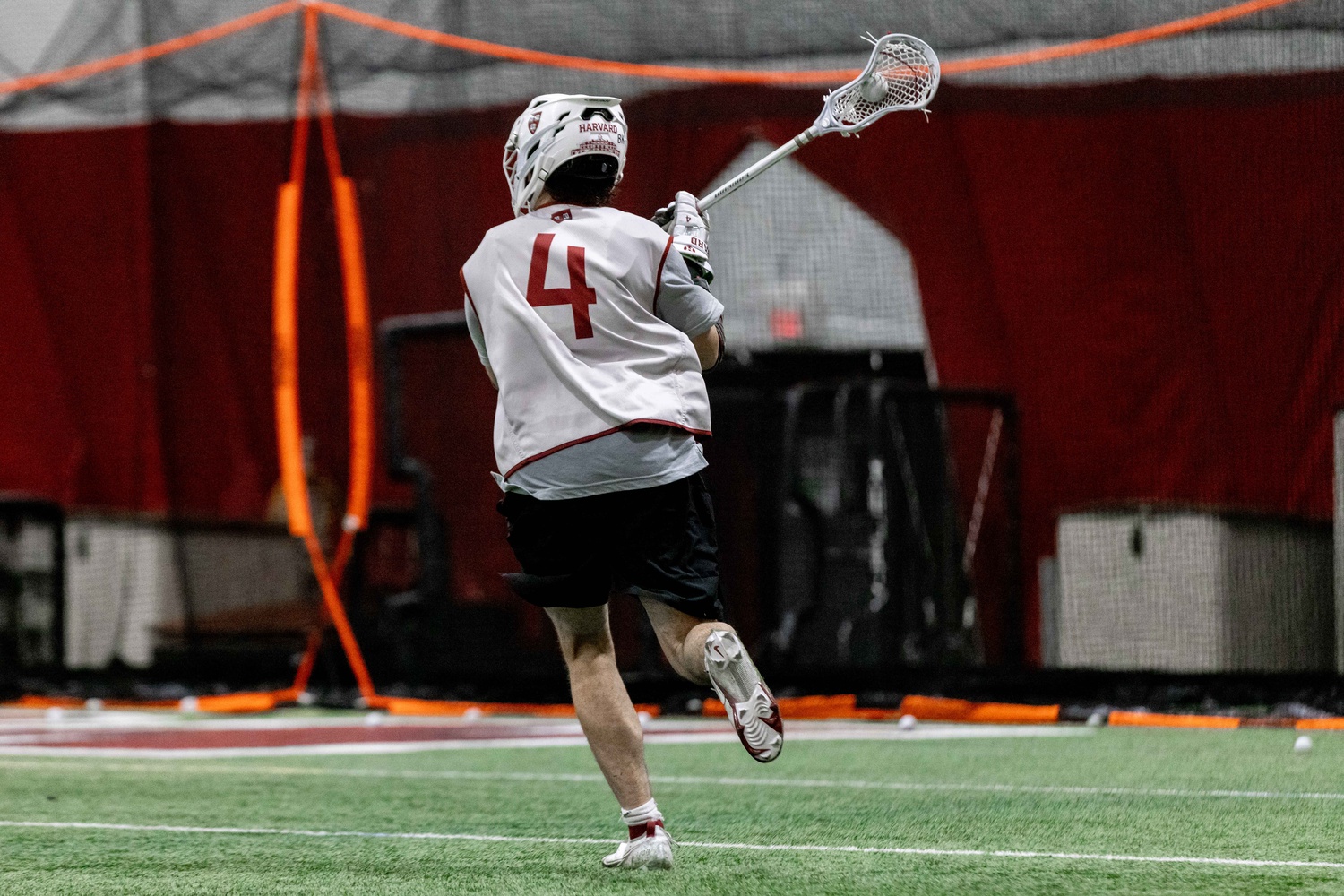 Sophomore attack and New England native Liam Griffiths runs towards the goal in Harvard's first scrimmage last weekend. This weekend, Harvard will travel down to Virginia for the first official game of its 2023 season.
