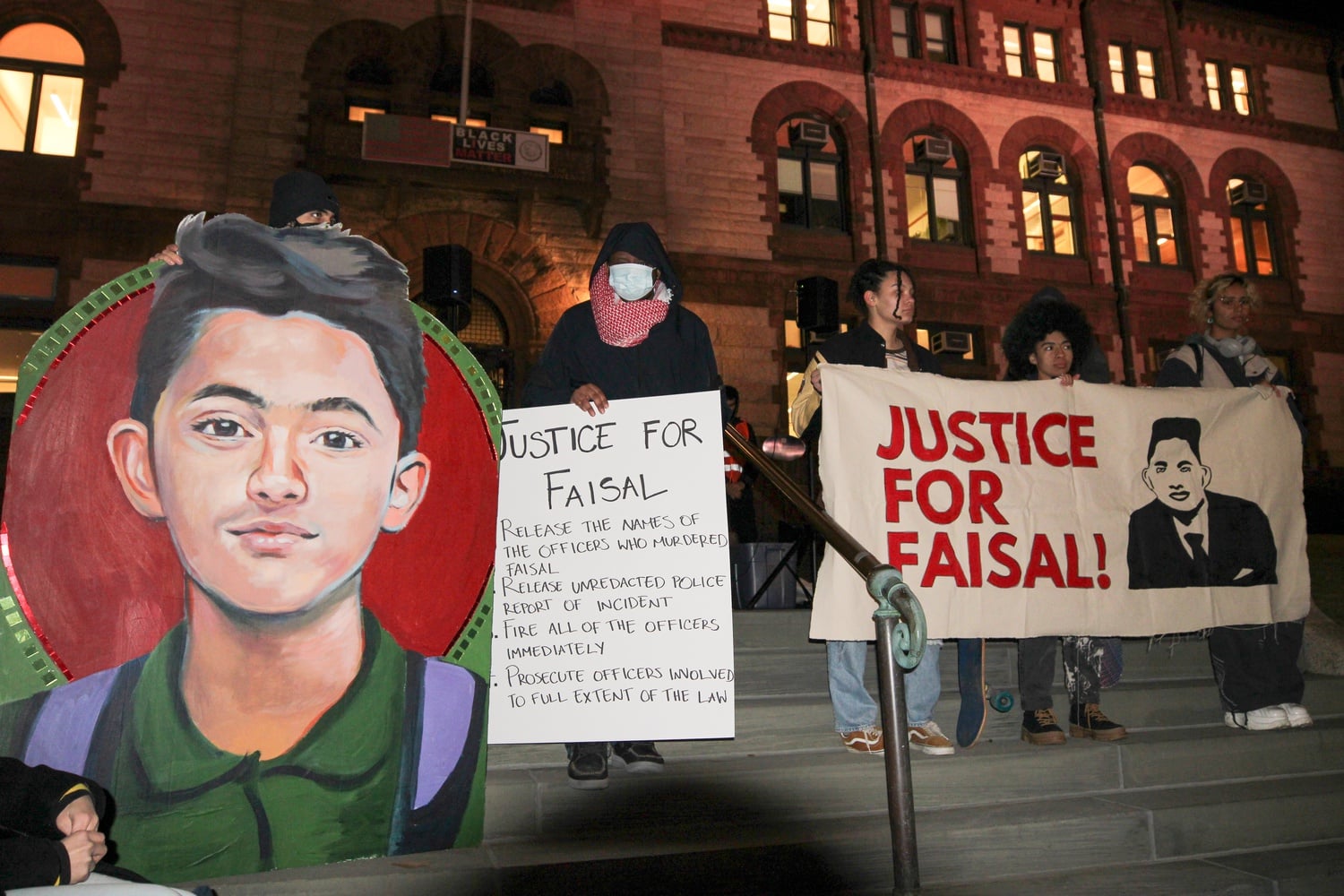Students from Boston-area schools gathered on the steps of City Hall for a protest against the police killing of Sayed Faisal on Feb. 13.
