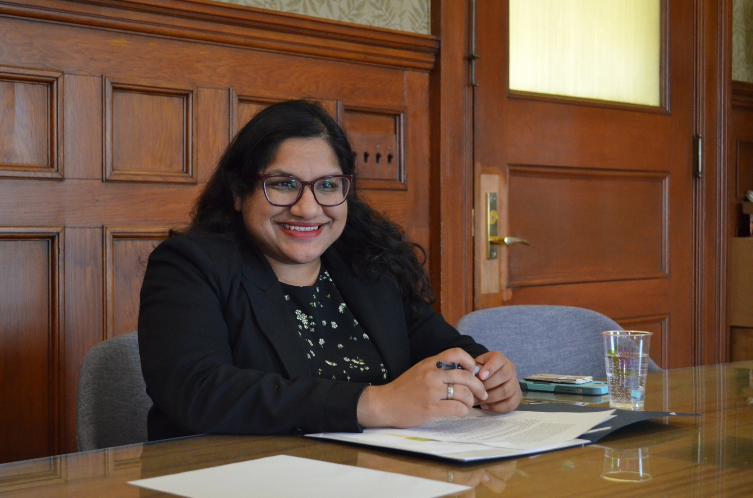 Cambridge Mayor Sumbul Siddiqui talks about her educational goals in her office in Cambridge City Hall.