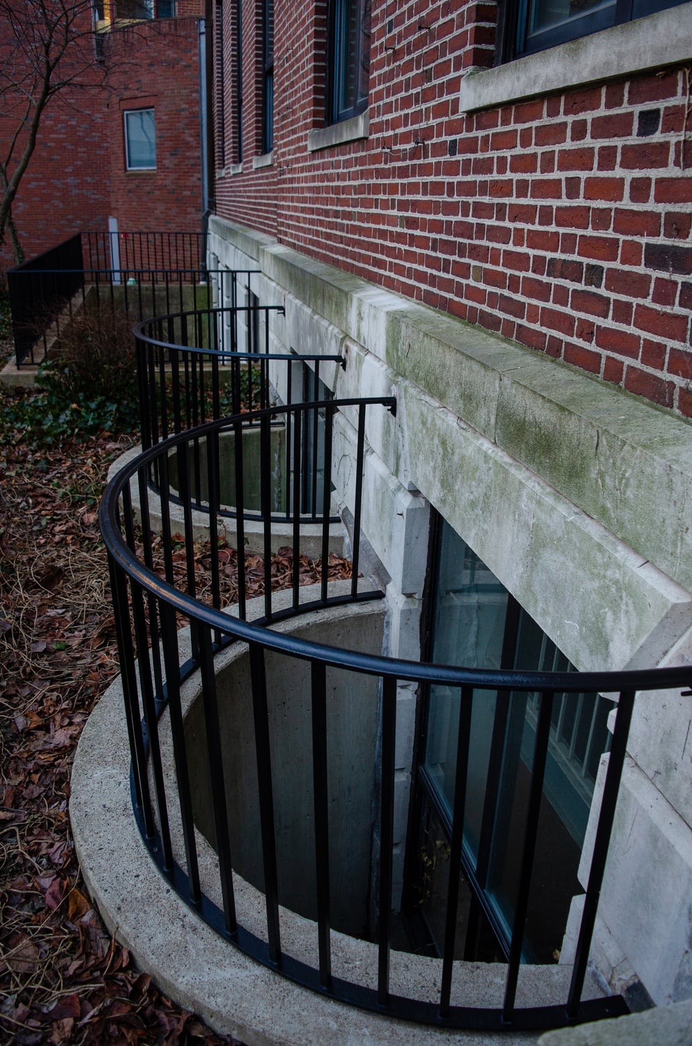 Window wells in Converse were useful for experiments. Fieser and Hershberg placed pans of samples in the window wells and lit them with matches.