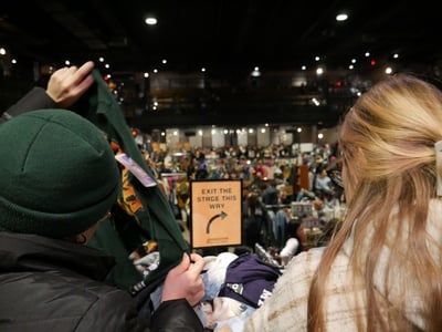 Cover image for Customers Looking at Vintage T-Shirts
