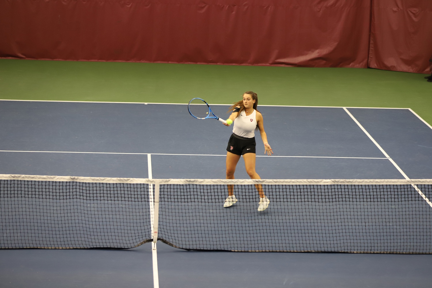 Sophomore Rachel Arbitman returns a volley against Boston College on November 7, 2021.