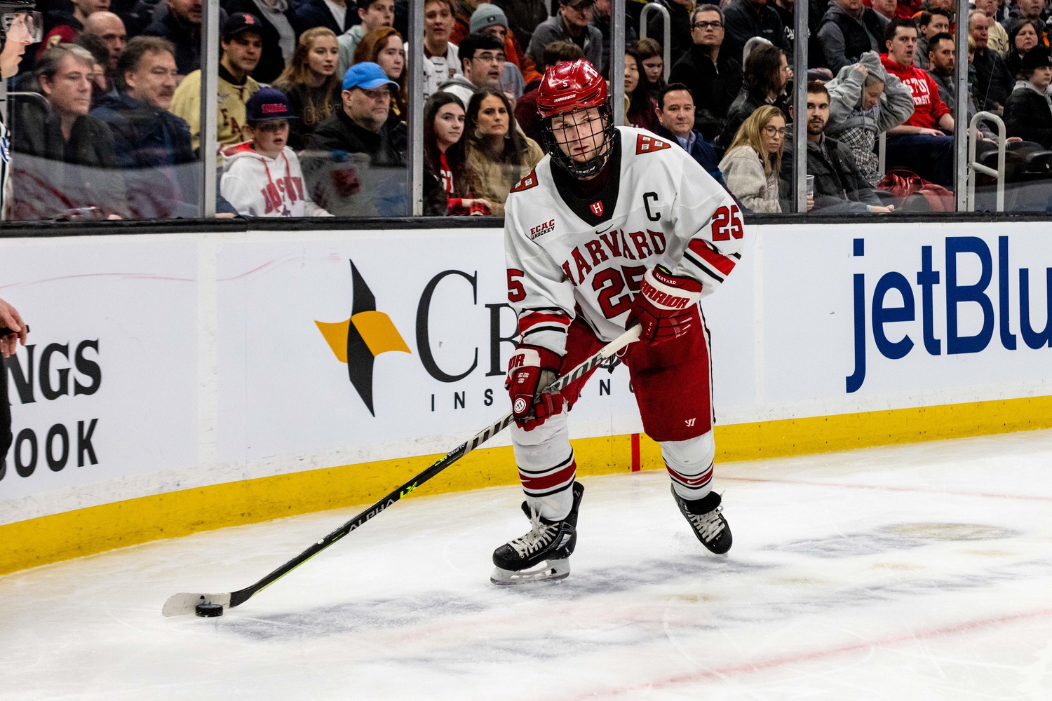 Senior forward and captain John Farinacci sets up in the corner against Boston College in the Beanpot semifinal on February 6.