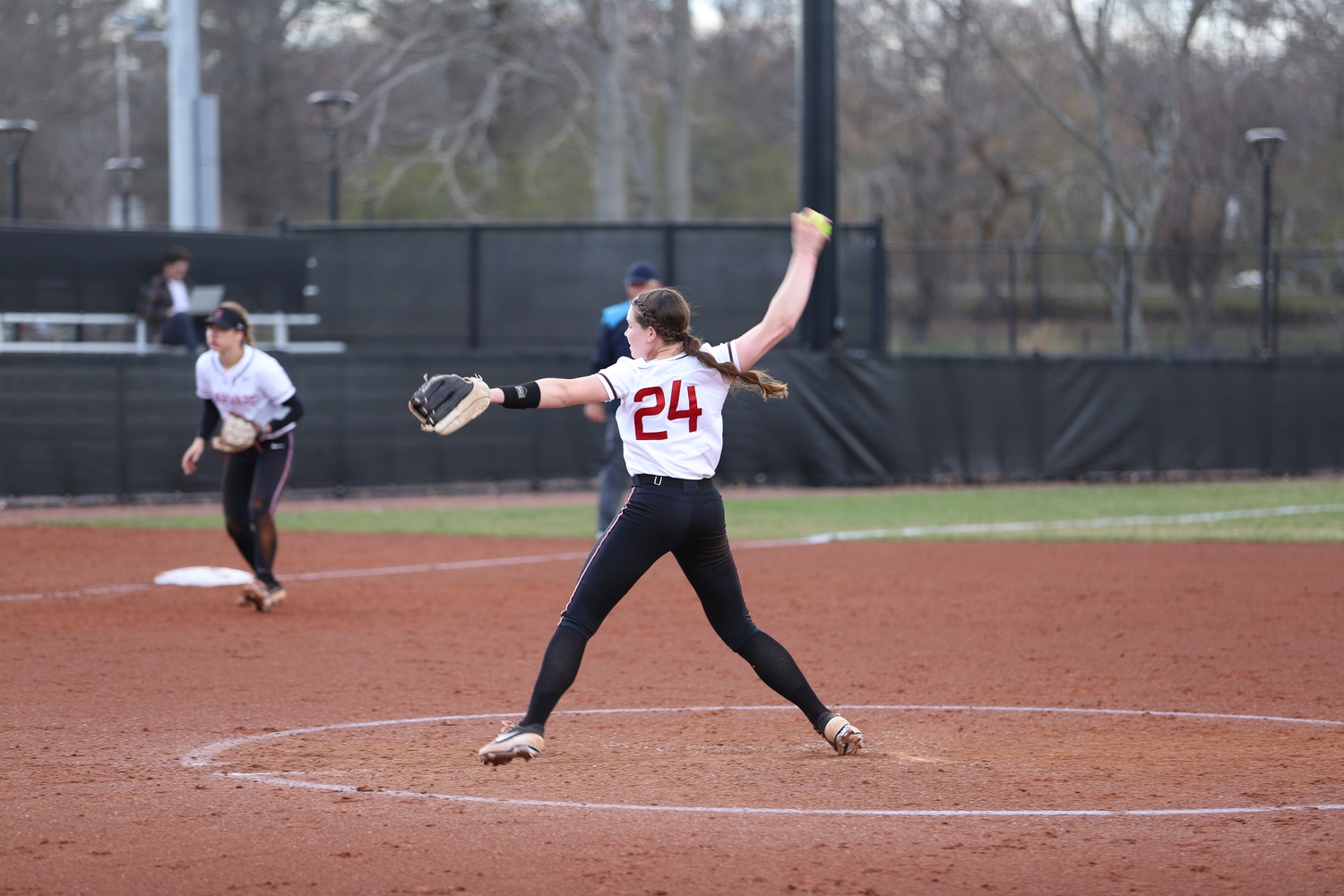 Then-junior Brianna Jewett goes through her windup against BU on April 5, 2022. Jewett will serve as one of Harvard's captains in 2023.
