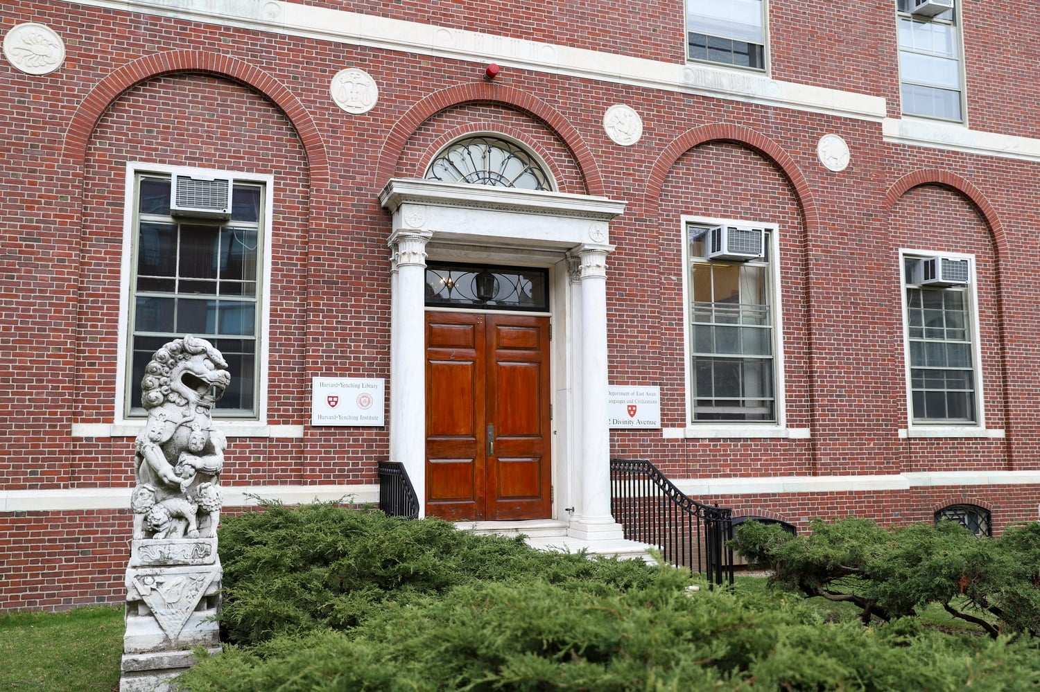 2 Divinity Ave. has switched hands a few times since it was first erected in 1930, and vestiges of its past still remain on its facade.