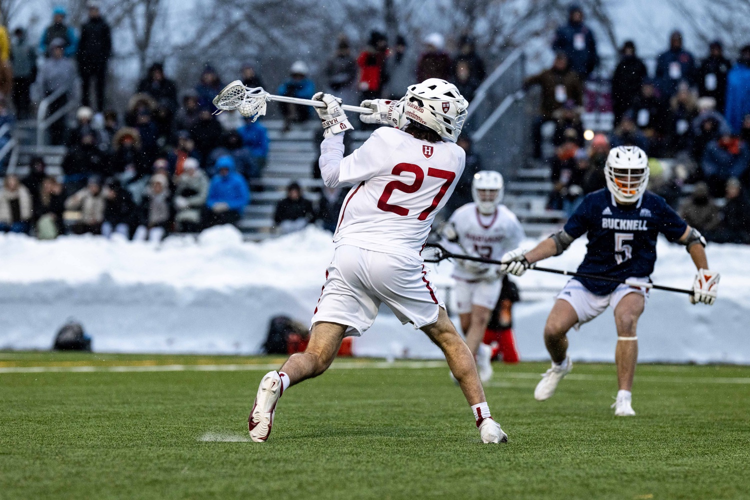 Sophomore Miles Botkiss winds up to shoot against Bucknell on February 25.