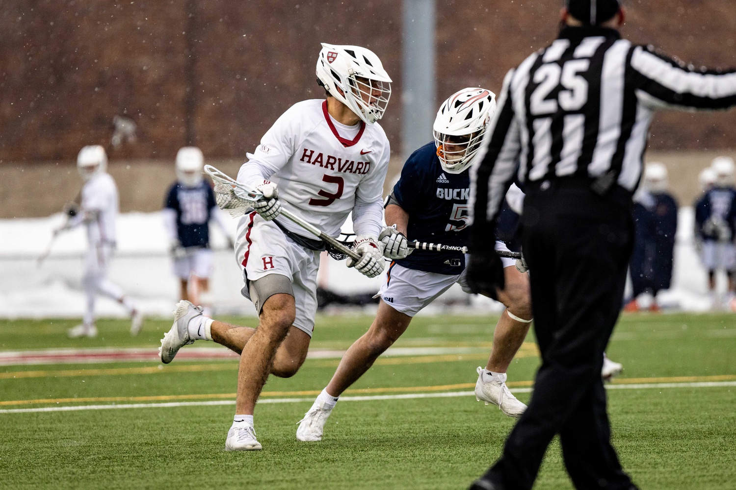 Senior Nick Loring shields off the Bucknell defense on February 25.