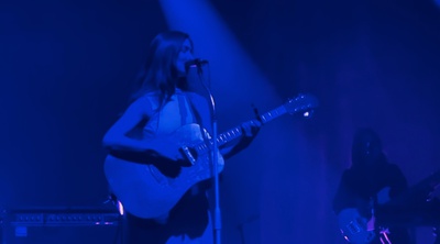 Cover image for Concert Review: Weyes Blood Glows on Stage