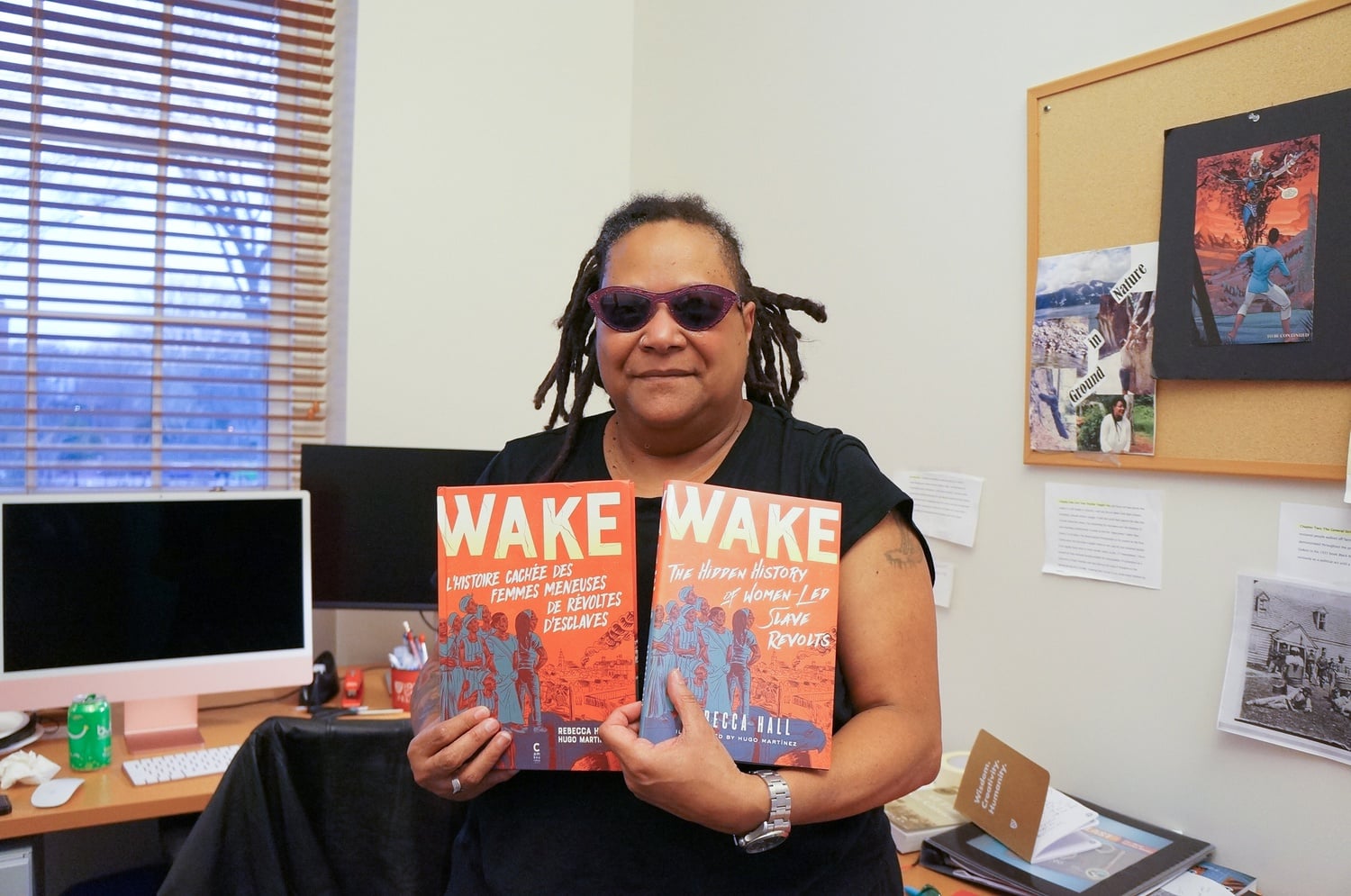 Rebecca Hall holds up her graphic novel, "Wake," which has been translated into French, German, Turkish, and Japanese. Hall remains in a state of disbelief at just how much her book resonated with people across the world.
