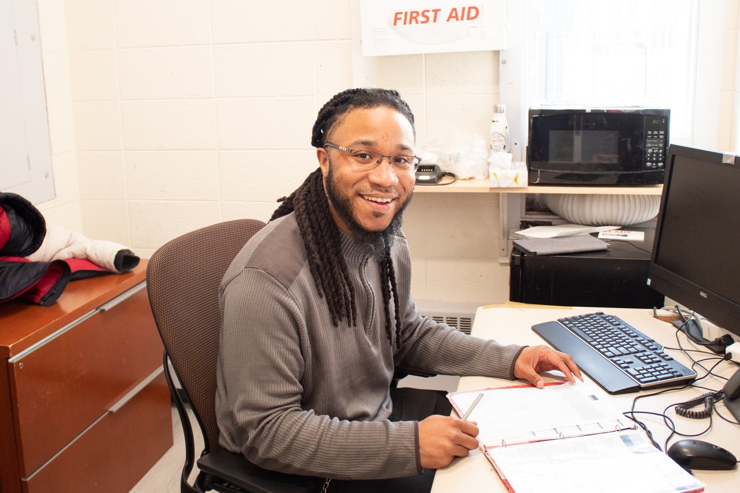 Mike Grant, a security guard at Leverett House — an undergraduate dormitory — says his job remains at risk following a dispute over a student grill.