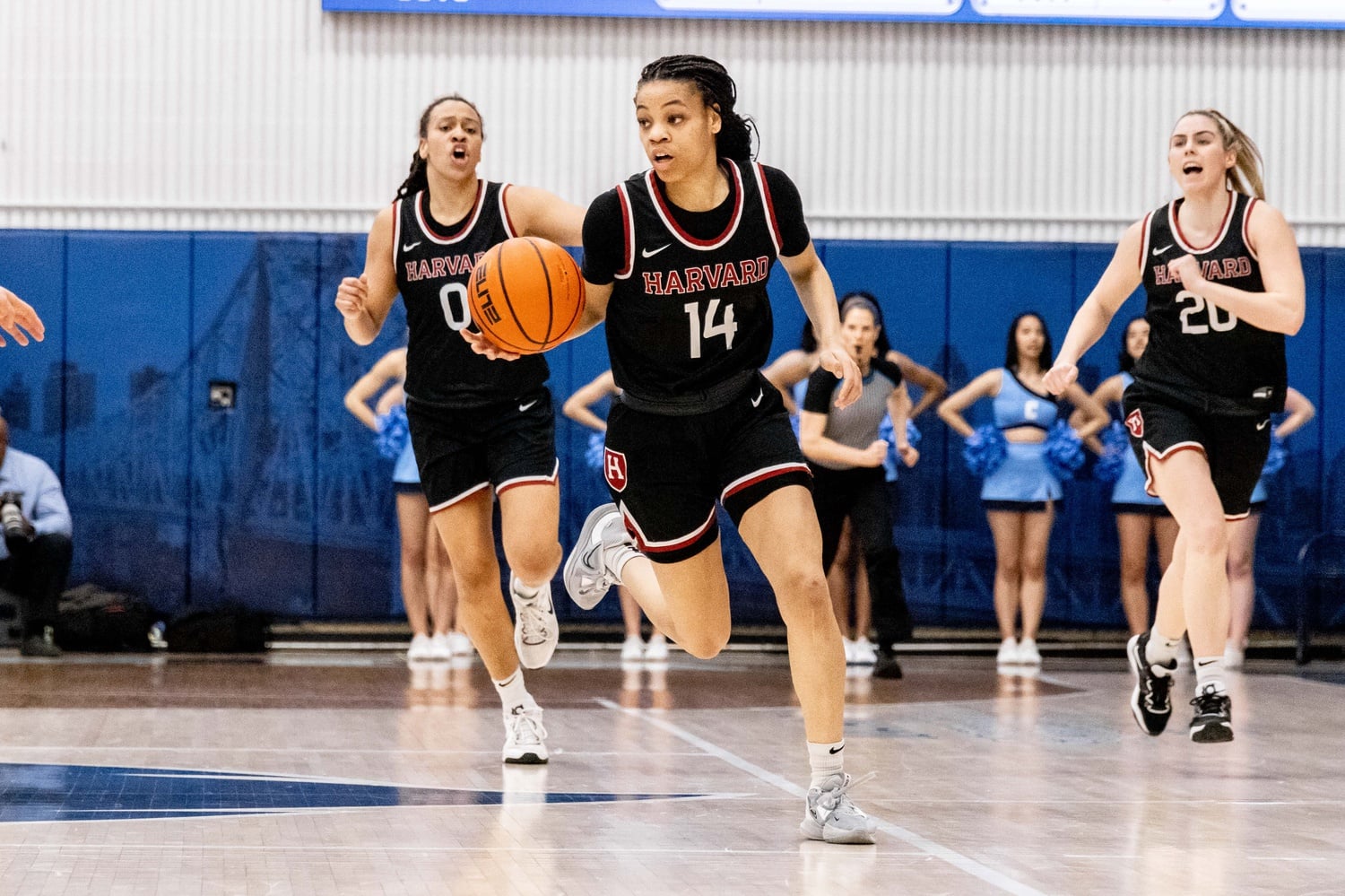 Sophomore guard Harmoni Turner dribbles the ball in the Great Eight game against Columbia on March 26, at which Harvard fell to Lions 77-71. Turner has been a critical player for the Crimson this season and leads Harvard in scoring.