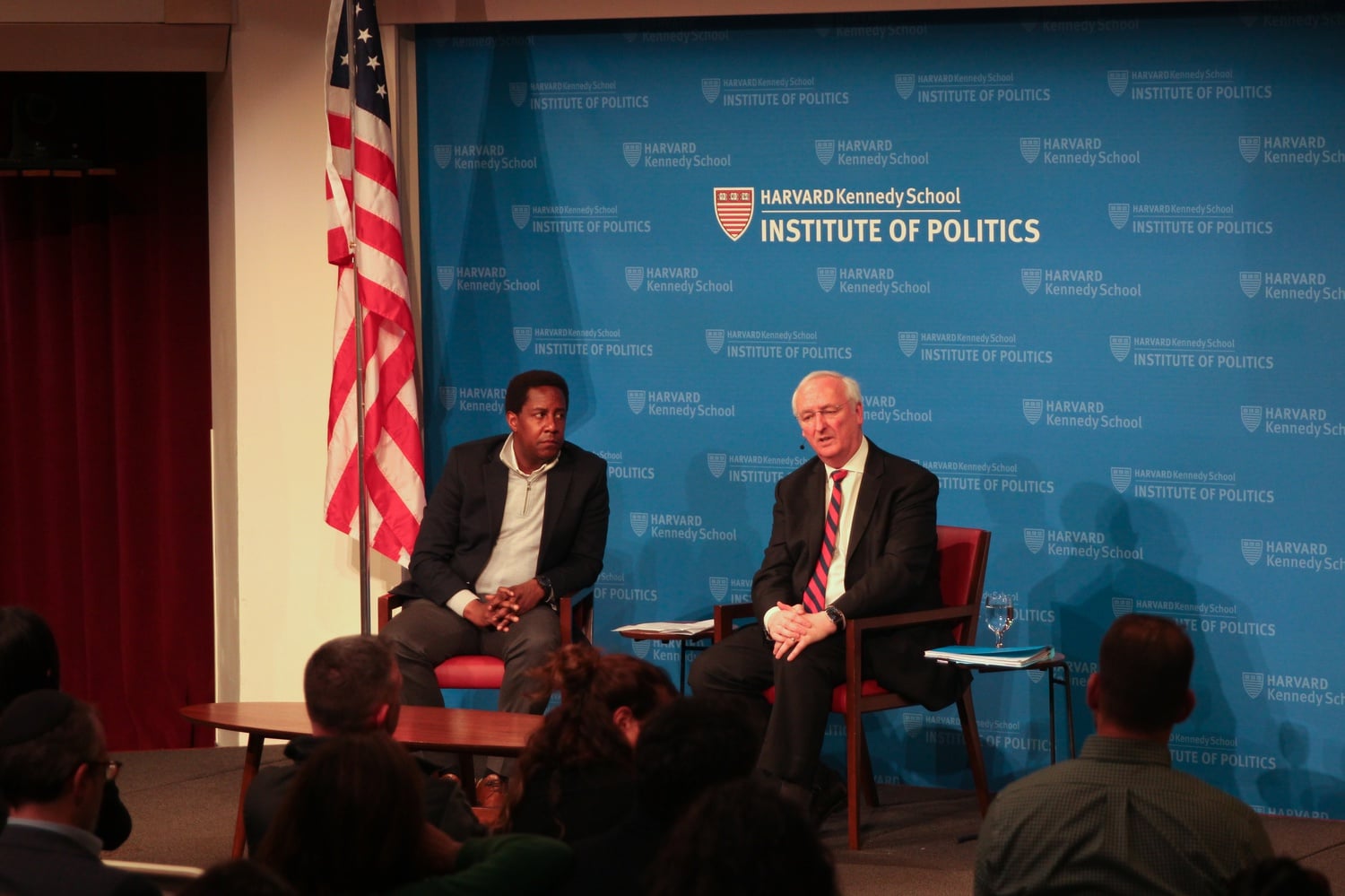 Former acting U.S. Attorney General Jeffrey A. Rosen speaks to Institute of Politics Director Setti Warren at a JFK Jr. Forum Monday evening on the rising threat of antisemitism.
