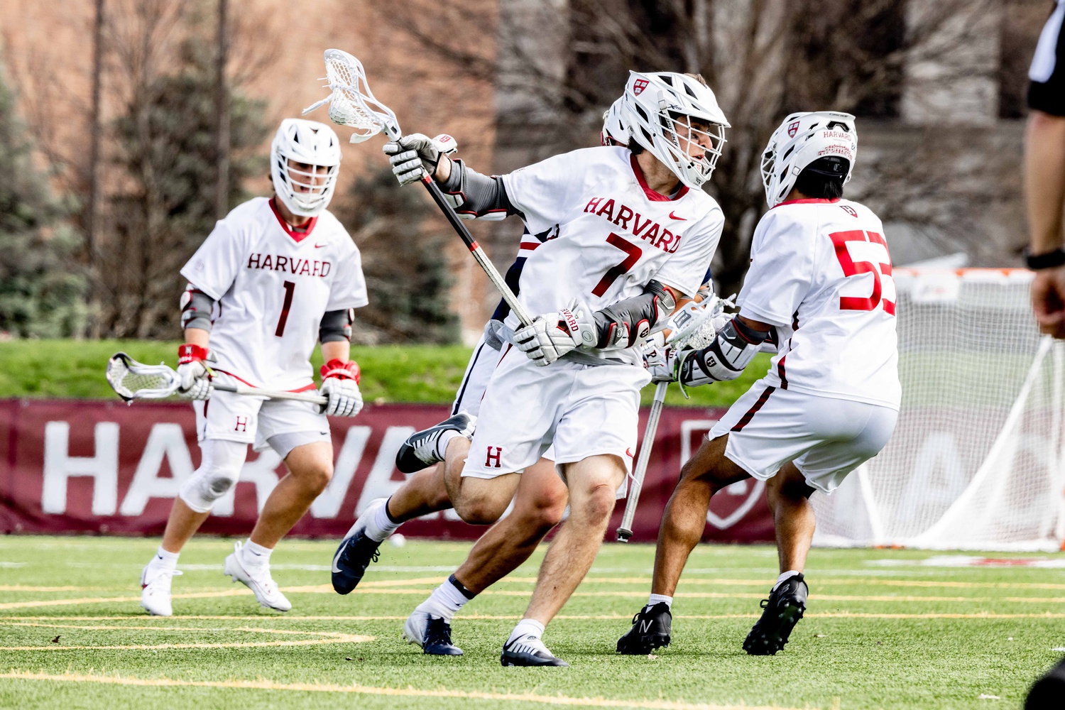 Sophomore attacker Sam King moves through traffic against Penn on April 15.