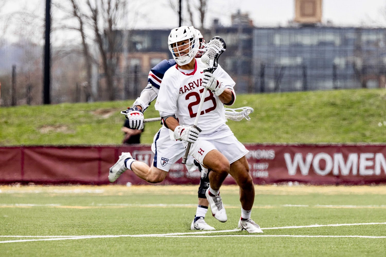 Senior middie Isaiah Dawson turns up the field against Penn on April 15.