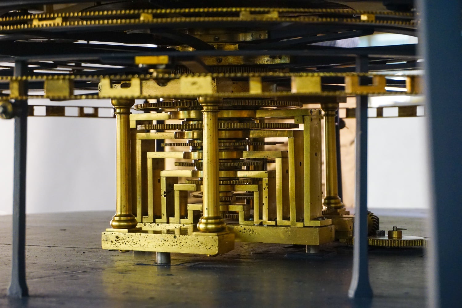 The gears at the center of the Grand Orrery. The hand-cranked orrery once vividly demonstrated the orbital paths of the first six known planets orbiting the Sun; today, the crank on the orrery no longer functions.