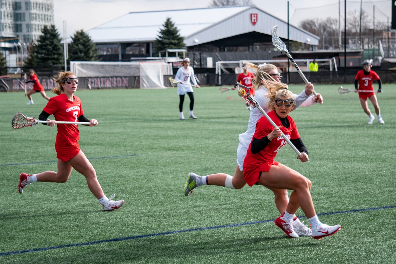 The Big Red offense is swarmed by the Crimson on February 29, 2020.