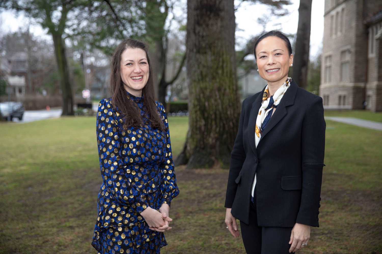 Meredith L. "Max" Hodges '03, left, will serve as president of Harvard's Board of Overseers, while Geraldine Acuña Sunshine '92, right, will serve as vice chair of the body's executive committee.