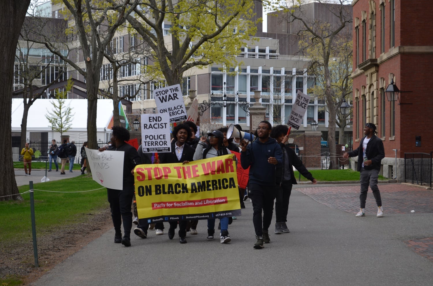 Demonstrators rallied in Harvard Yard in solidarity as Black student leaders met with University administrators about the school's response to the Leverett House "swatting" attack.