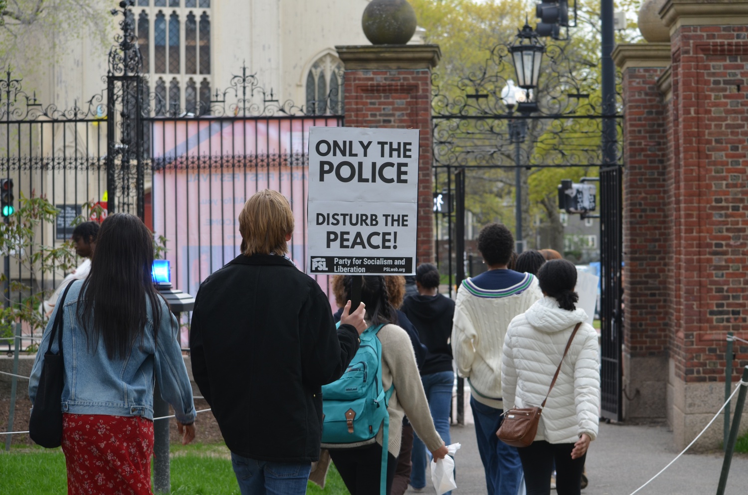 Demonstrators rallied in Harvard Yard in solidarity as Black student leaders met with University administrators about the school’s response to the Leverett House “swatting” attack.