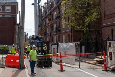Cover image for Harvard Construction Lift Tips Into Adams House