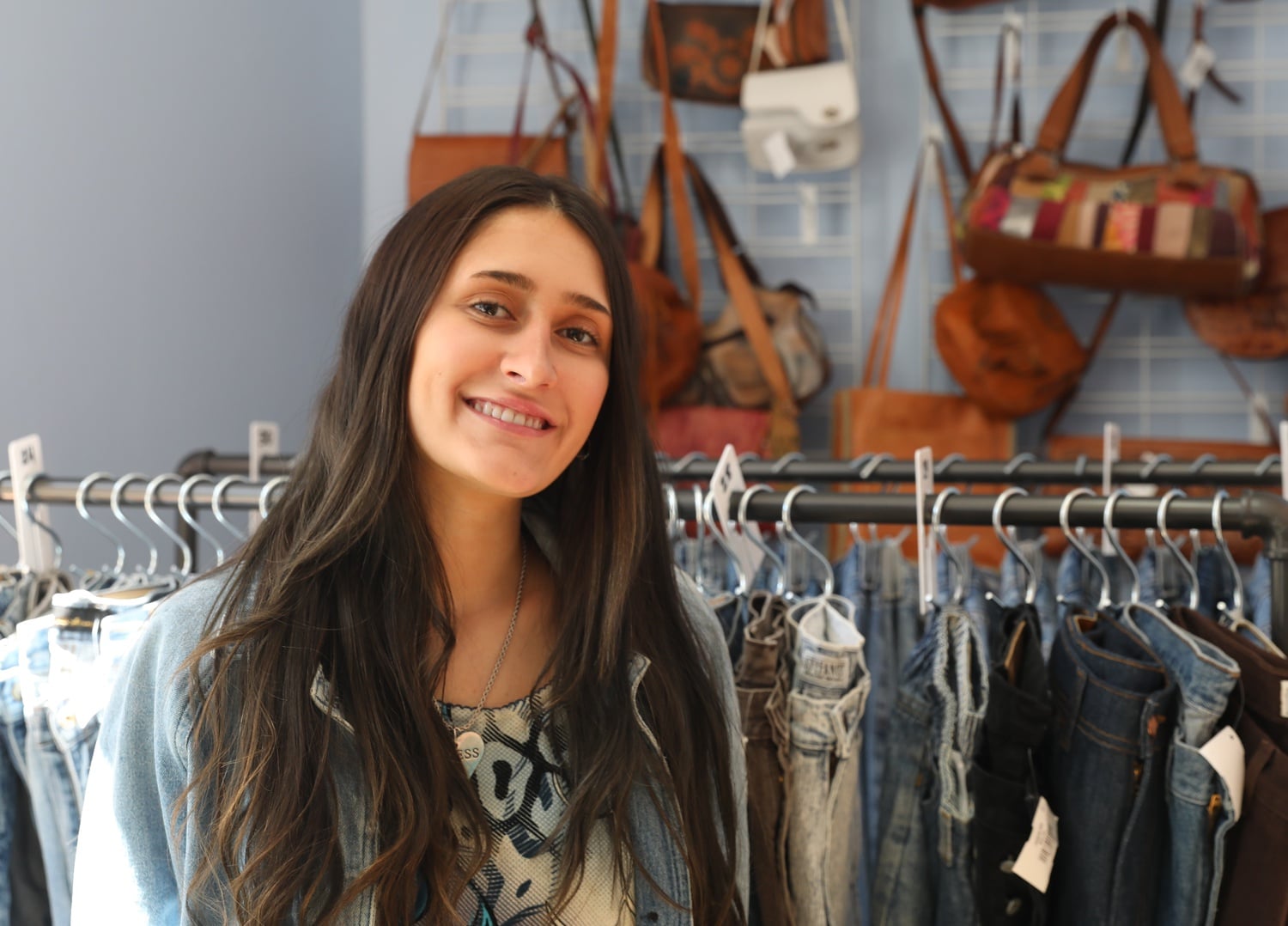 Jenna Cea-Curry is the owner of The Attic, a newly opened Harvard Square clothing store. Cea-Curry expressed optimism about the economic state of businesses in Harvard Square.