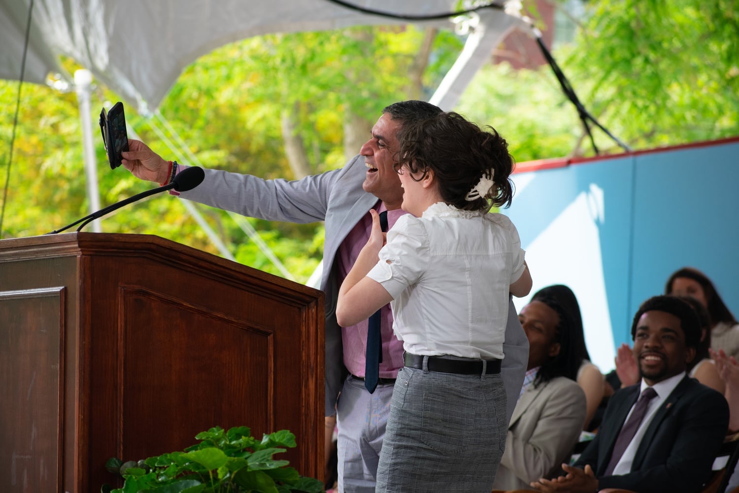 Dean Khurana takes a selfie with Amelia M. Cossentino '23, who delivered the Ivy Oration at Class Day.