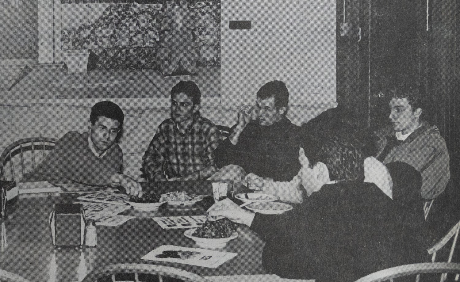 Members of the Grape Coalition discuss strategy over bowls of grapes at Adams House.