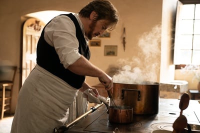 Cover image for Still of Benoît Magimel in "The Pot-Au-Feu."
