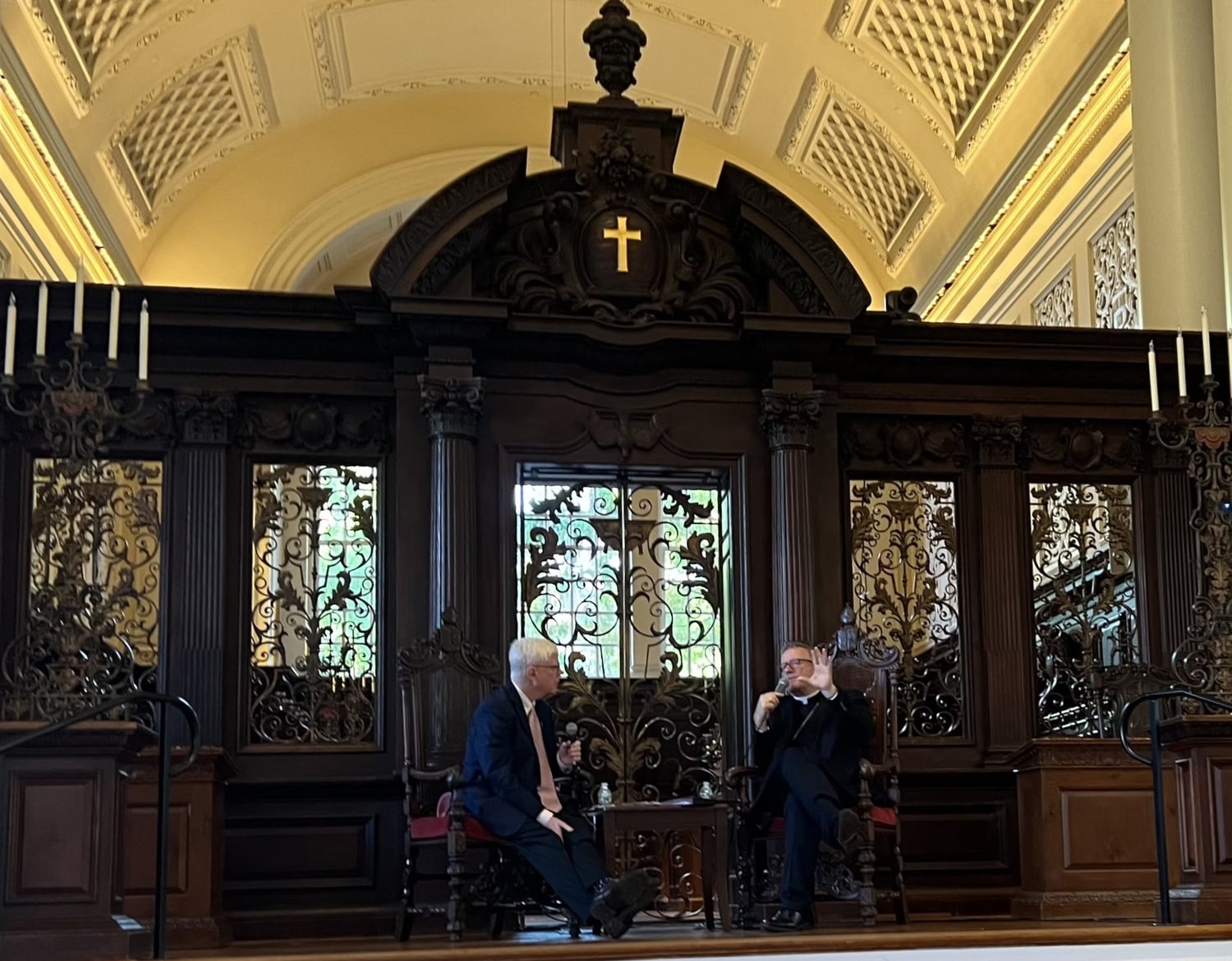 Bishop Robert E. Barron, right, discussed the fundamental claims of Catholicism at a lecture in Memorial Church Sunday.
