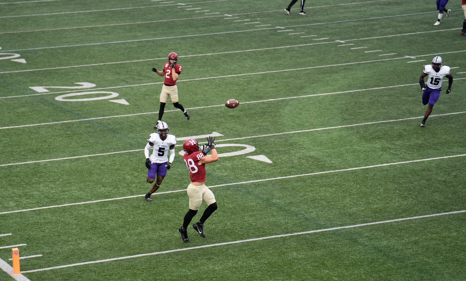 Senior tight end Tyler Neville catches a touchdown pass against St. Thomas on Sept. 16, 2023.