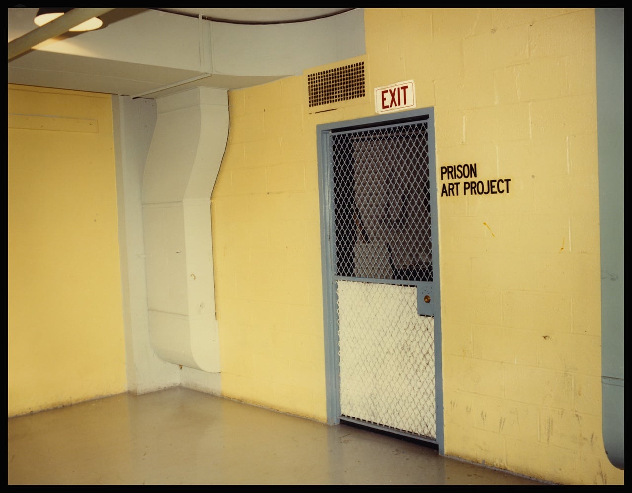 The Prison Art Project room at Walpole Prison in the 1980s. Art made by incarcerated men was exhibited in the Phillips Brooks House in 1966.